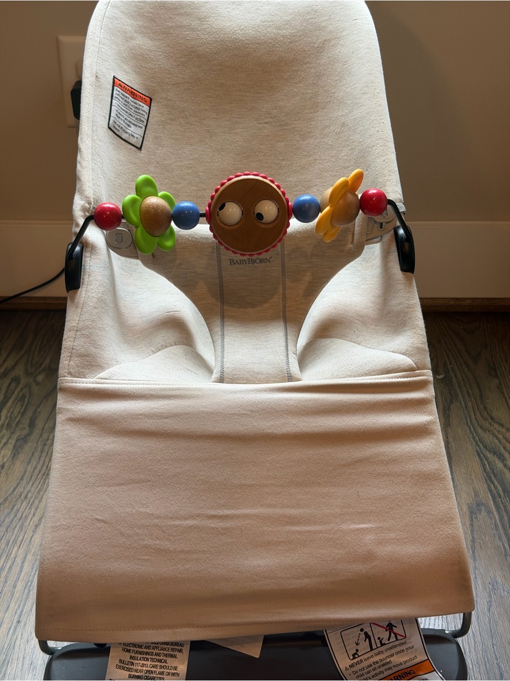 Bjorn Borg Beige Baby Bouncer with Colorful Toy Bar